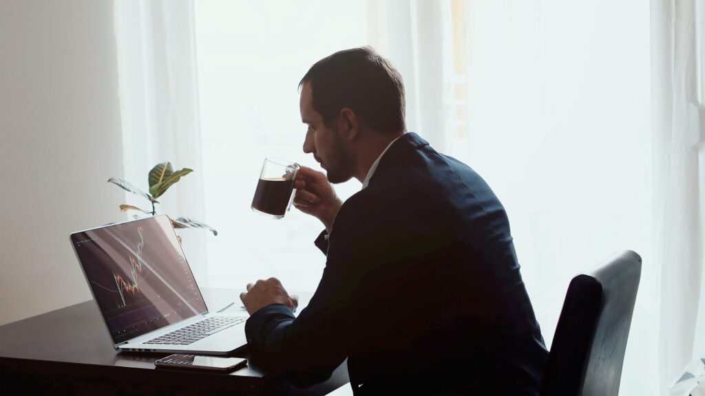 Image of a man working with a computer